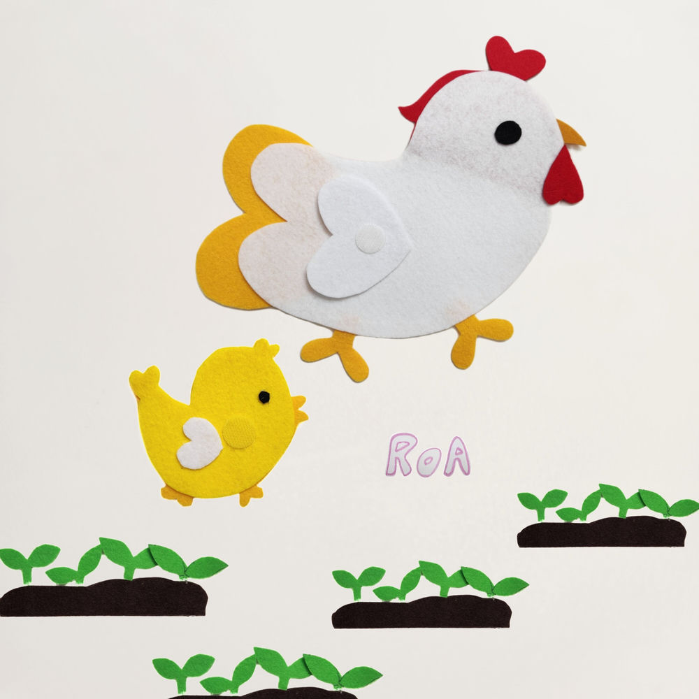 A chicken and a baby chick